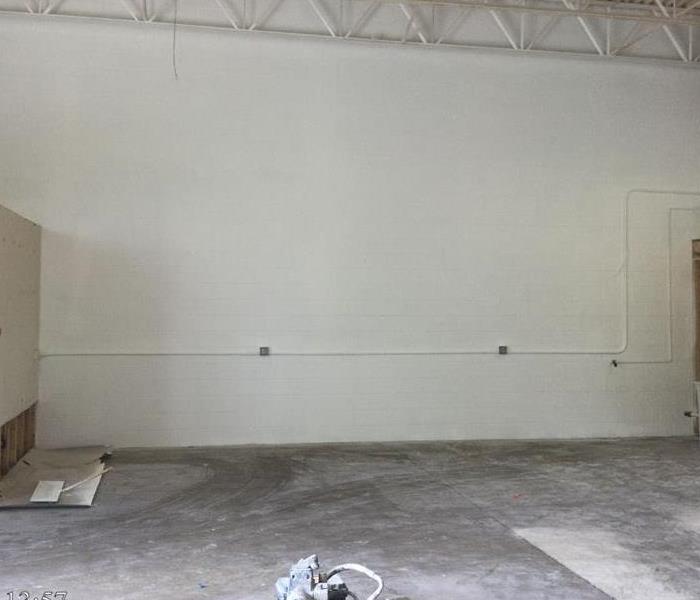 White concrete wall of commercial building after mold remediation