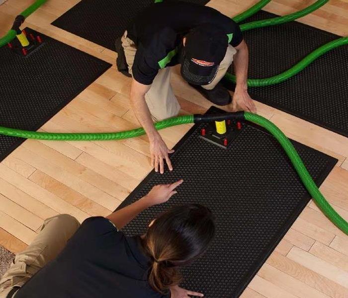 SERVPRO wood floor drying system